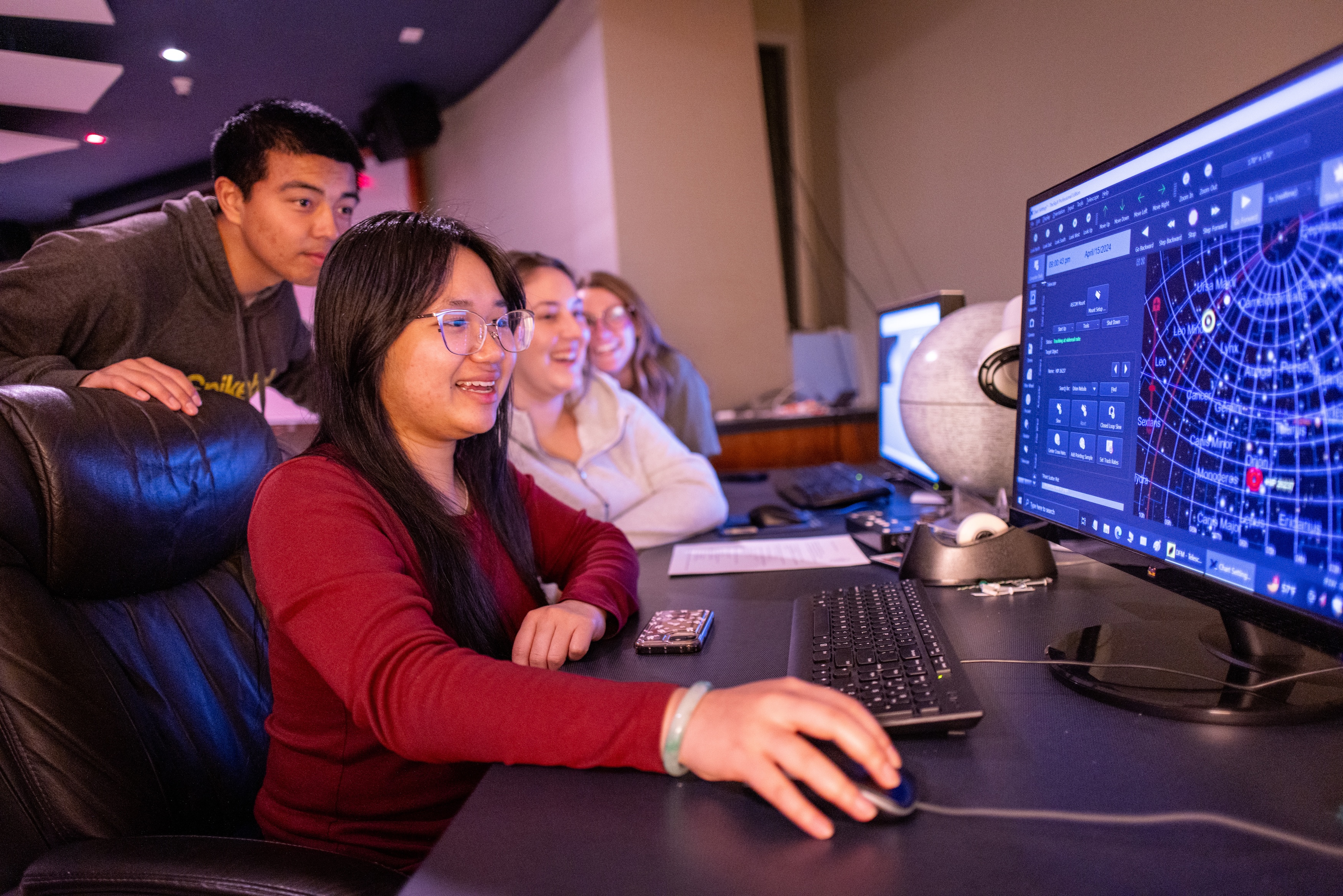 Astrophysics Minor students on computer