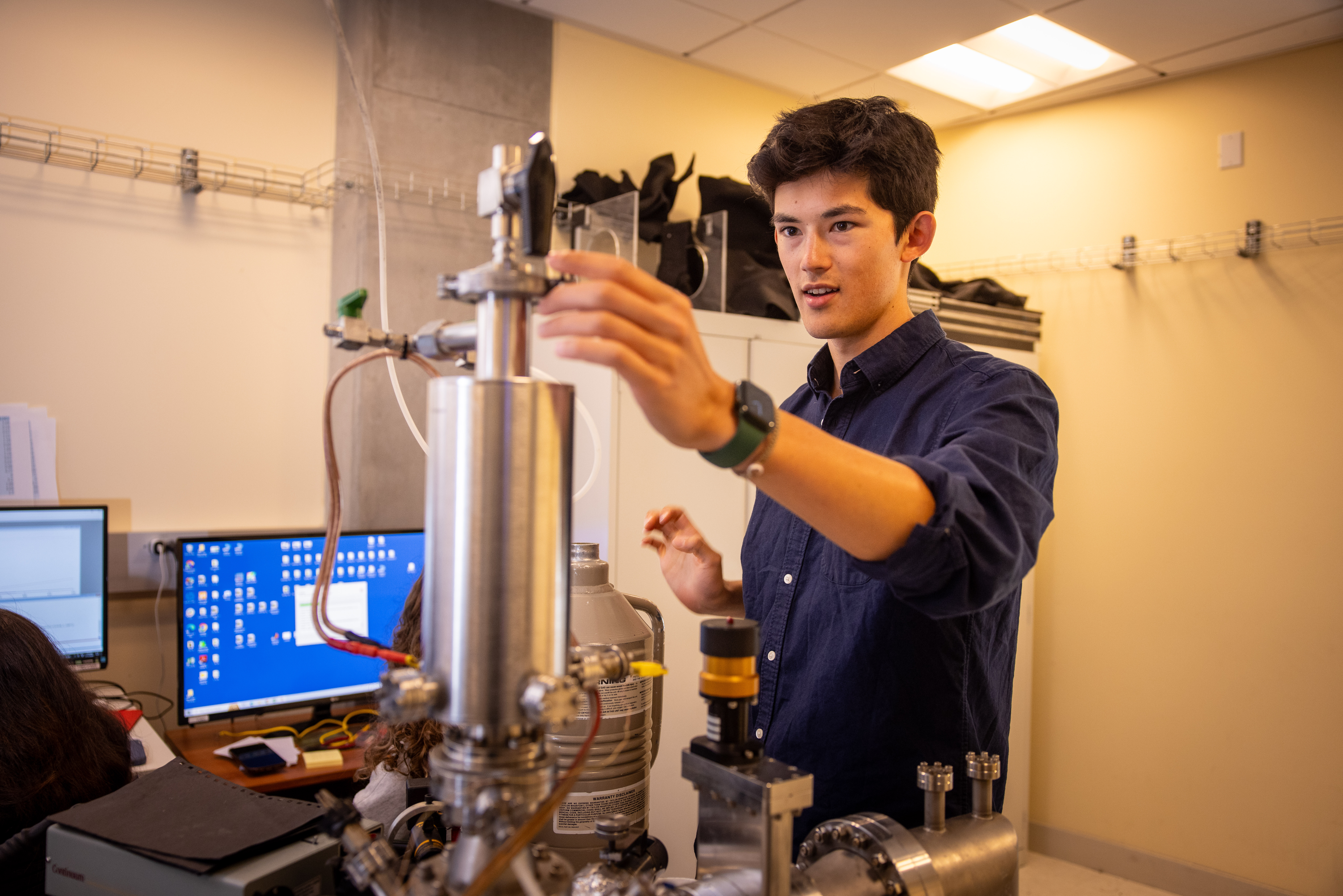 male student in classroom