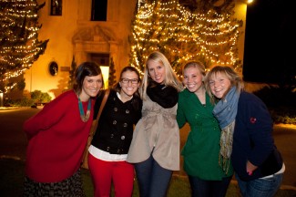 Students enjoy the traditional lighting of the Pickle Tree