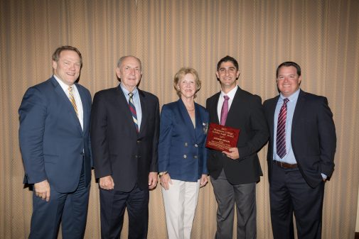 Rob Ruiz poses with Andrew Devian. Also pictured: President Gayle D. Beebe, Pete and Gerd Jordano.